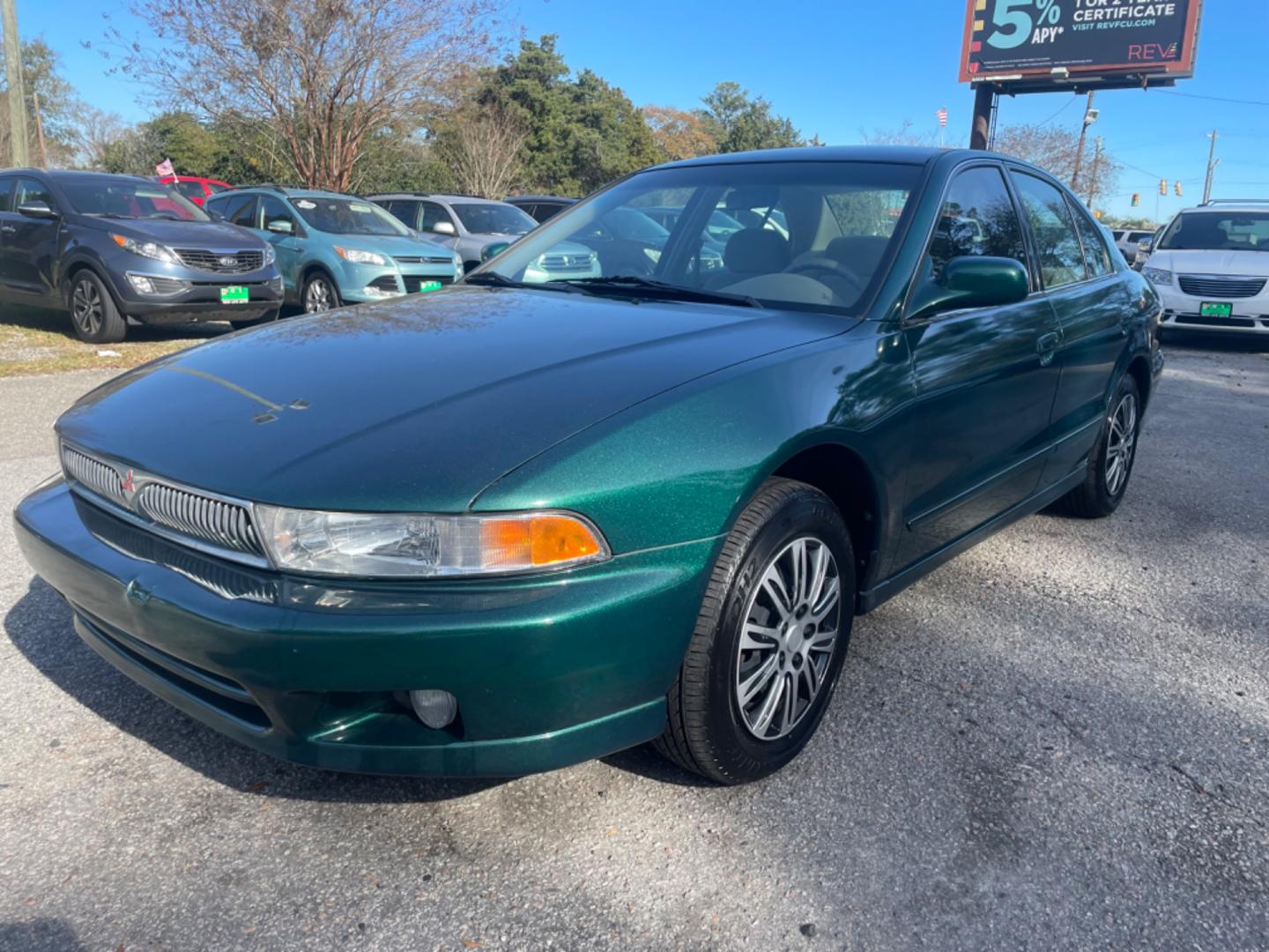 2001 GREEN MITSUBISHI GALANT ES (4A3AA46G31E) with an 2.4L engine, Automatic transmission, located at 5103 Dorchester Rd., Charleston, SC, 29418-5607, (843) 767-1122, 36.245171, -115.228050 - Shimmery Green Exterior, Clean Interior with AM/FM/AUX/USB, Power Windows, Power Locks, Power Mirrors. Runs Great! Only 92k miles!! Located at New Life Auto Sales! 2023 WINNER for Post & Courier's Charleston's Choice Pre-owned Car Dealer AND 2018-2023 Top 5 Finalist for Charleston City Paper's BEST - Photo#2